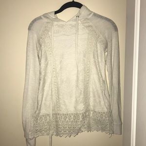 Cream colored shirt with hoodie